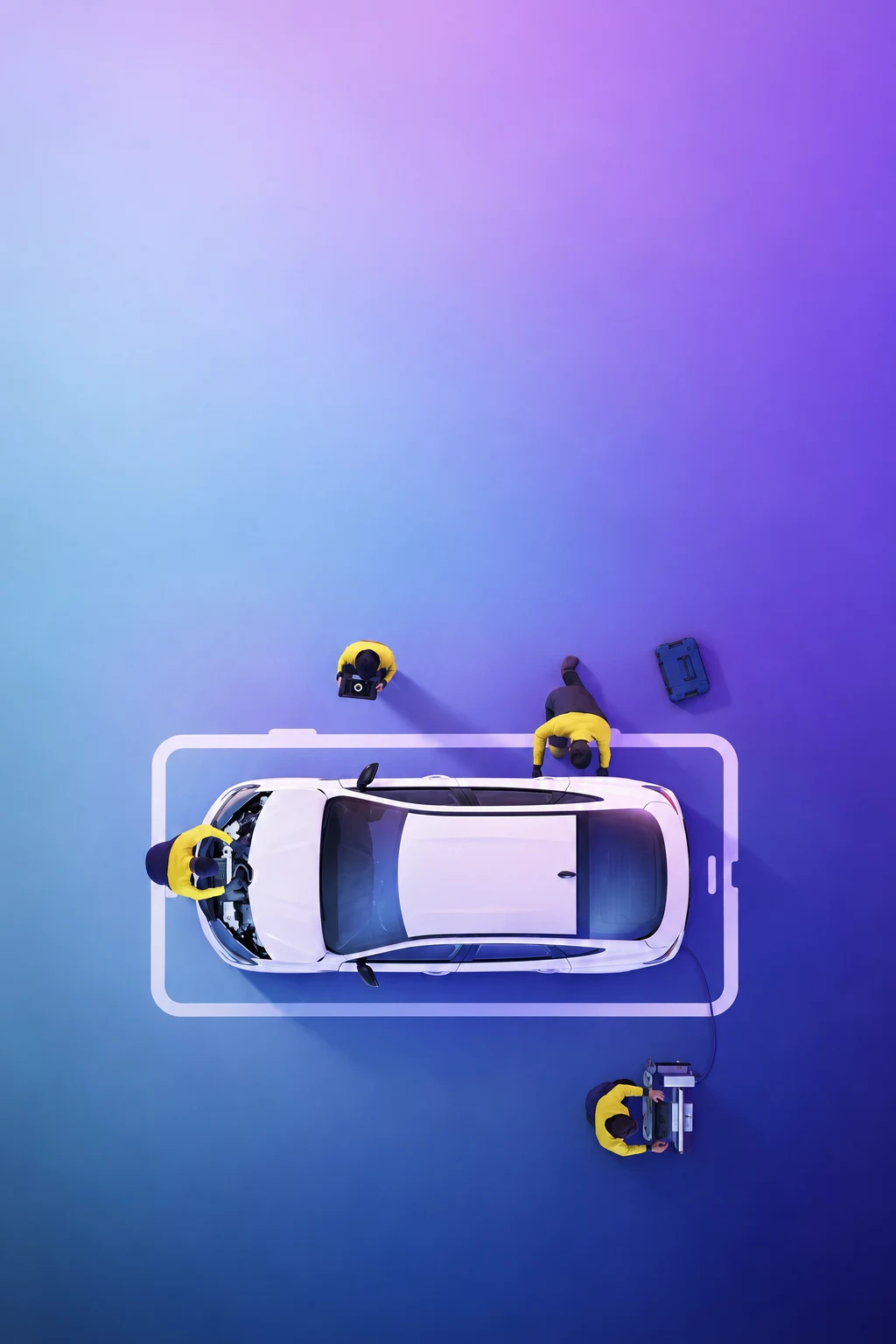 Vista aérea de un Renault en el taller con mecánicos revisándolo